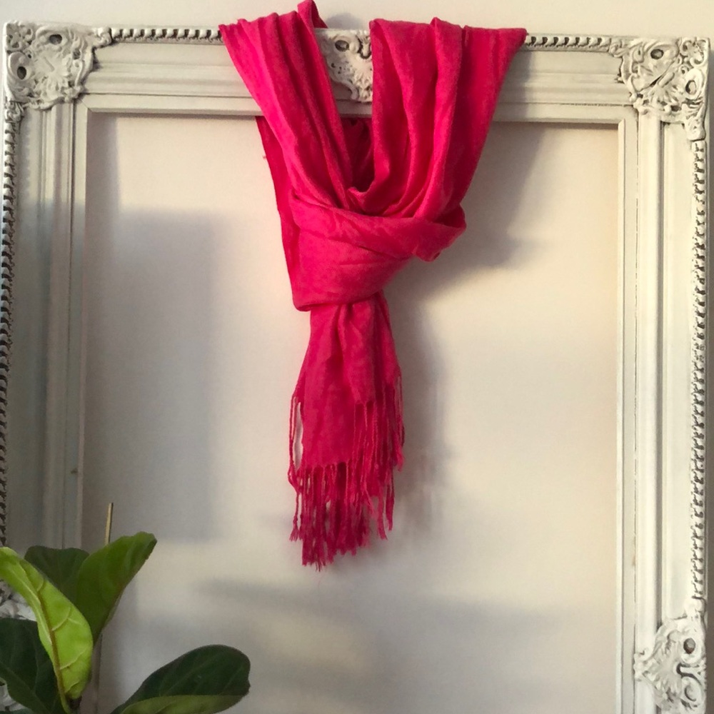 Shocking pink scarf.